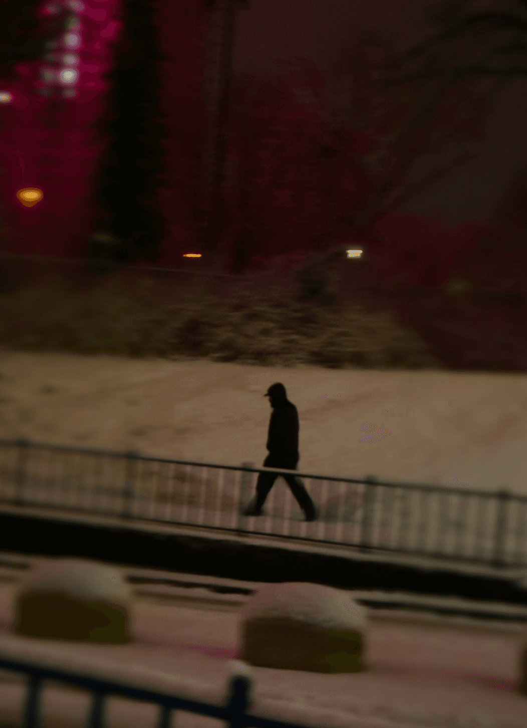person walking in snow storm